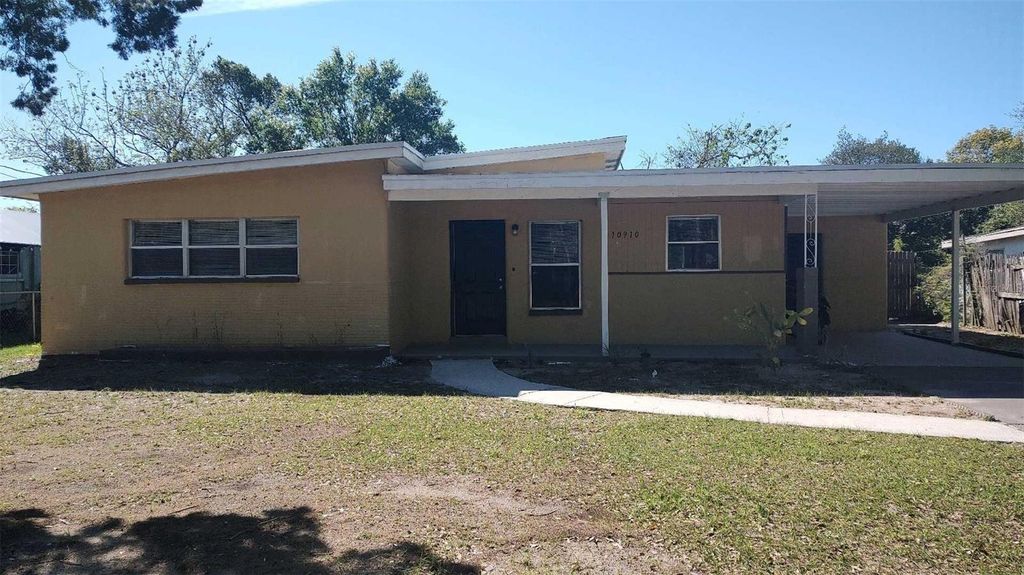 Photo of 10910 N 15th Street, Tampa, FL 33612 (MLS # O6393275)