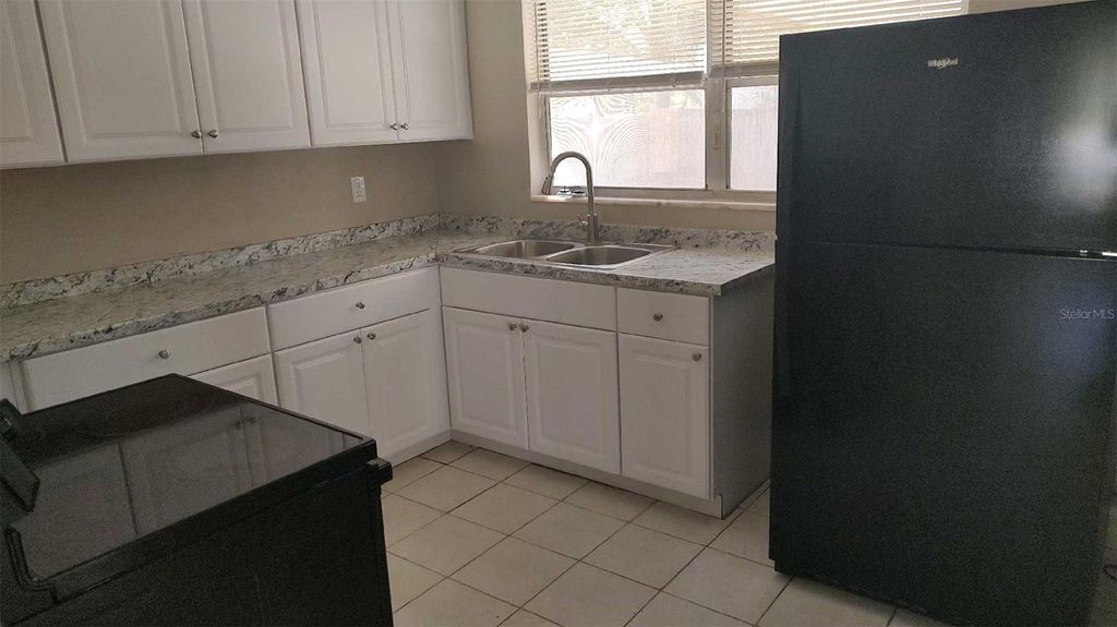 Photo of 10910 N 15th Street, Tampa, FL 33612 (MLS # O6393275)