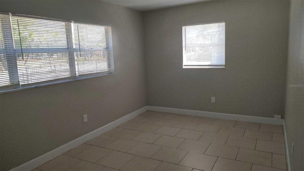 Photo of 10910 N 15th Street, Tampa, FL 33612 (MLS # O6393275)