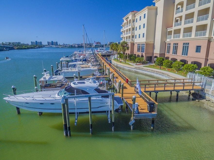 Exceptional opportunity to acquire a 40'x18' deep water boat slip at Harborside Marina in picturesque Madeira Beach, situated directly on the Intracoastal Waterway, just north of the Tom Stuart Causeway. The marina features gated access and an onsite dockmaster. A brand new 15,000 lb lift is included. Owners have the option to join the Captains Club for an additional fee, which provides access to the adjacent Courtyard Marriott Hotel's facilities, including a fitness center, coin-operated laundry, swimming pool, and discounts on hotel rooms and food and beverages at the bistro.
