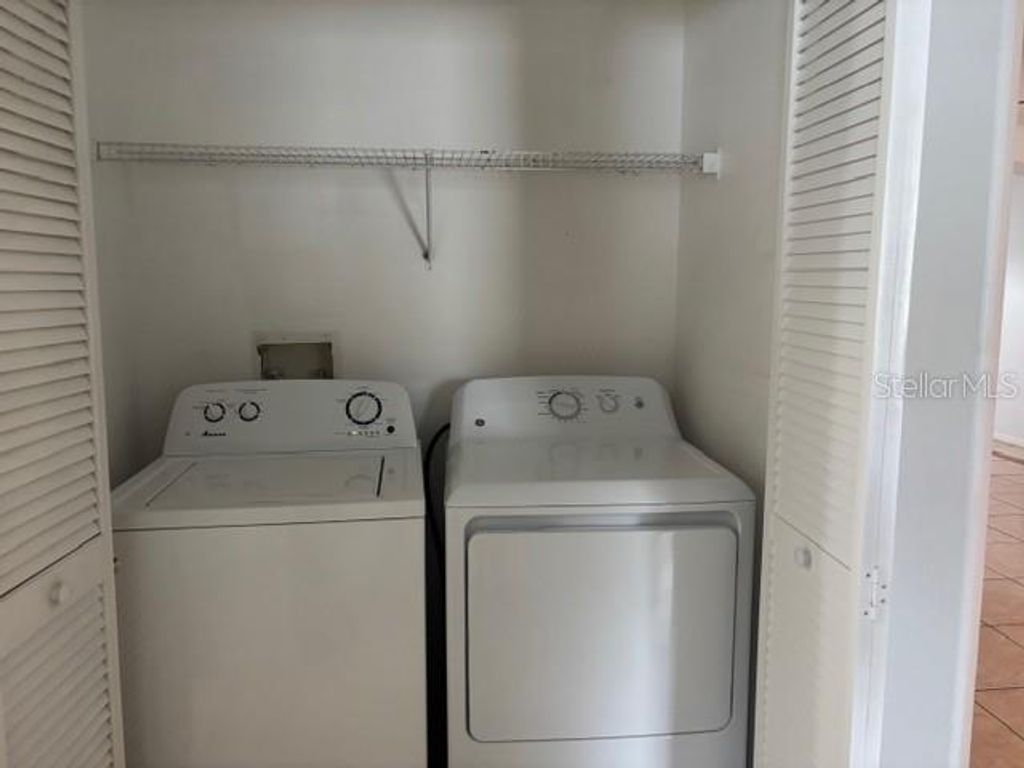 Photo of 13325 Fairway Glen Drive #102, Orlando, FL 32824 (MLS # S5147766)