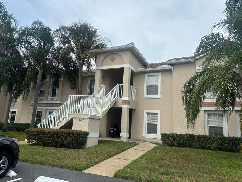 Photo of 13325 Fairway Glen Drive #102, Orlando, FL 32824 (MLS # S5147766)