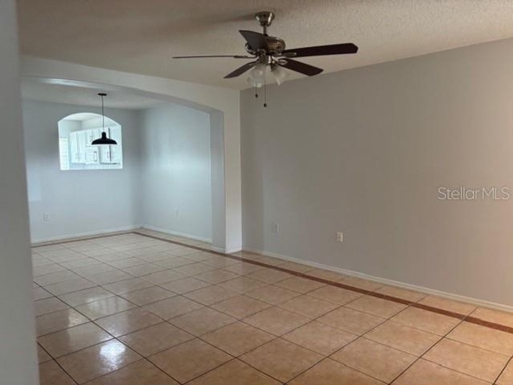 Photo of 13325 Fairway Glen Drive #102, Orlando, FL 32824 (MLS # S5147766)
