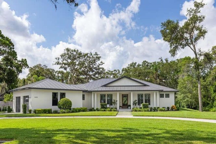 Welcome to your dream oasis in the heart of Sarasota, close to I-75 just North of Fruitville. This stunning, newer build boasts a prime location that perfectly couples lifestyle with tranquility. Situated on just under 1 acre, this coastal contemporary offers the perfect blend of modern luxury and serene natural beauty. As you drive onto the property, you'll be greeted by a private setting that instantly puts you at ease; providing a retreat-like atmosphere that's hard to find West of I-75.The main residence showcases simplistic yet thoughtful design, with every detail carefully curated to create an atmosphere of elegance and comfort. The open layout with polished concrete floors allow for seamless flow between living spaces, making it ideal for both entertaining and everyday living. At the heart of the home is the beautifully appointed kitchen, featuring top-of-the-line Thermador appliances that cater to the needs of any chef or baker. The fine craftsman styling with transom windows and custom millwork are a real treat. As you step out to your lanai, you'll discover a private outdoor haven that invites relaxation and leisure. Lounge on your spacious patio, complete with outdoor kitchen perfect for al fresco dining or simply enjoying the Florida sunshine in the gorgeous pool. With a nod to versatility, this property also includes a secondary building that offers endless opportunity. Compete with a rare and highly desirable upstairs guest apartment boasting 266 sqft of space. This brand new, never lived in studio, comes complete with a full bath and washer/dryer. Whether you envision a home office, a personal gym, or an art studio this space can adapt to your desires with ease. The 28’ x 48’ garage is large enough to house your offshore boat, RV, car collection or equipment. Don't miss the chance to own this exceptional property, where newer construction, prime location, and coastal contemporary design come together in perfect harmony. Experience the best of Sarasota living in your own private sanctuary. Schedule your private showing!