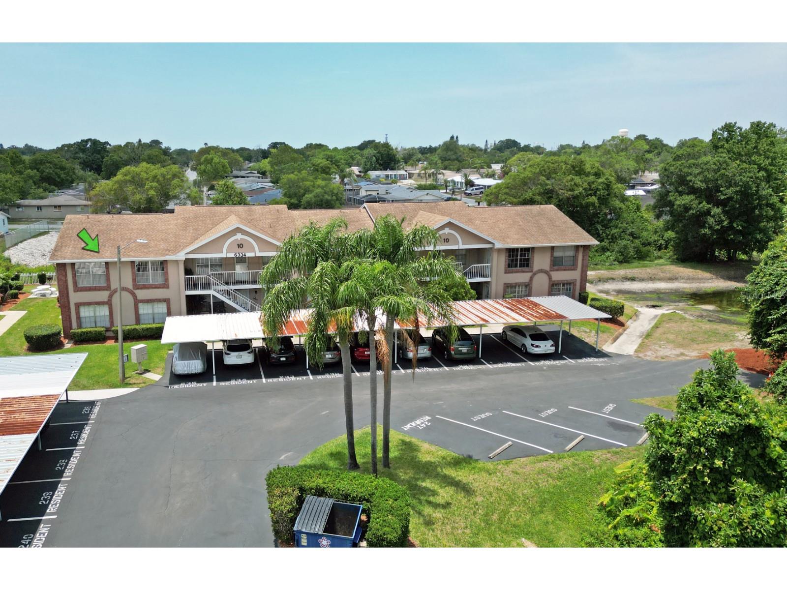 Under contract-accepting backup offers. Welcome to this wonderful well kept, second floor condo, end unit, pet friendly and 55+ gated community of Sunnybrook.
These 2-bedroom 2 full bath condo has been freshly painted, vaulted ceilings, open floor plan, split bedroom, new AC, stunning granite countertops plus new appliances, one step away leads you to a balcony to enjoy your morning coffee / unwind after a long day at work. Master bedroom offers a walk-in closet, also has inside laundry located in hallway, plenty of storage in the lanai and kitchen. Unit comes with a covered carport. Community is well maintained with large, heated pool, large hot tub, tennis courts, bocce court and pool tables. Clubhouse hosts bingo weekly and social events that sometimes include live entertainment. Conveniently located near shopping, restaurants, beaches and so much more to enjoy and that fit your lifestyle. Please check it out! Call for private showing.