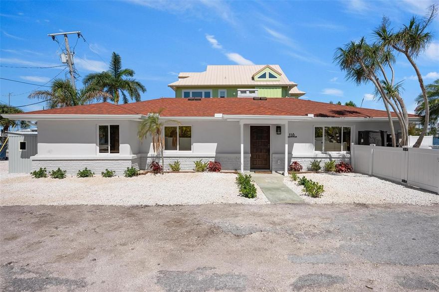 Welcome to island living at its finest on beautiful Anna Maria Island! This fully remodeled 3-bedroom, 2-bath waterfront retreat offers stunning full bay views, a private composite dock with water supply, seawall, and a sparkling saltwater pool with a heater and a cooling system designed for relaxing and entertaining. Tucked away at the end of a paved dead-end street, this property offers privacy, tropical landscaping, mature trees, and the ultimate coastal lifestyle.

Inside, the open-concept floor plan features luxury vinyl plank flooring, a dry bar, eating space in the kitchen, updated blinds, and beautifully renovated finishes throughout. The home underwent extensive renovations in 2025 and 2026, with a 2023 shingle roof already in place for peace of mind. Built with concrete exterior construction and stucco on a slab foundation, this property blends durability with modern coastal charm.

Best of all, this home is truly turnkey and fully furnished — everything conveys from the furniture, TVs, beds, appliances, washer and dryer, silverware, décor, and coffee makers! Just bring your suitcase and start enjoying island life immediately.

Step outside to your private backyard oasis complete with vinyl fencing around the pool area, irrigation system, outdoor grill, small storage shed, and multiple spaces to enjoy the waterfront scenery and coastal breezes.

Located with no HOA and no deed restrictions, this property also offers exceptional investment potential with weekly rentals permitted, making it an ideal vacation home, second home, or income-producing property. Public water, public sewer, and central heat and air complete the package.

Rarely does a move-in-ready waterfront property with this level of remodeling, furnishings, and rental flexibility become available on Anna Maria Island. Schedule your private showing today and experience the best of Florida Gulf Coast living!