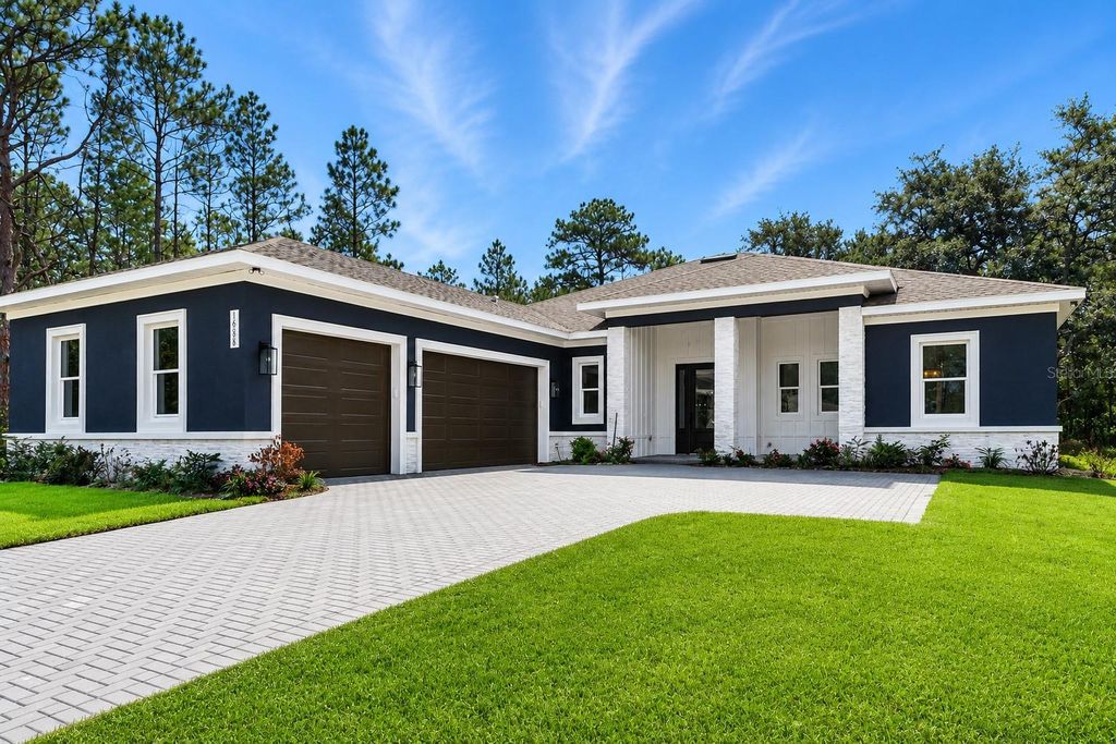 Photo of 16098 Mellon Road, Weeki Wachee, FL 34614 (MLS # W7887563)
