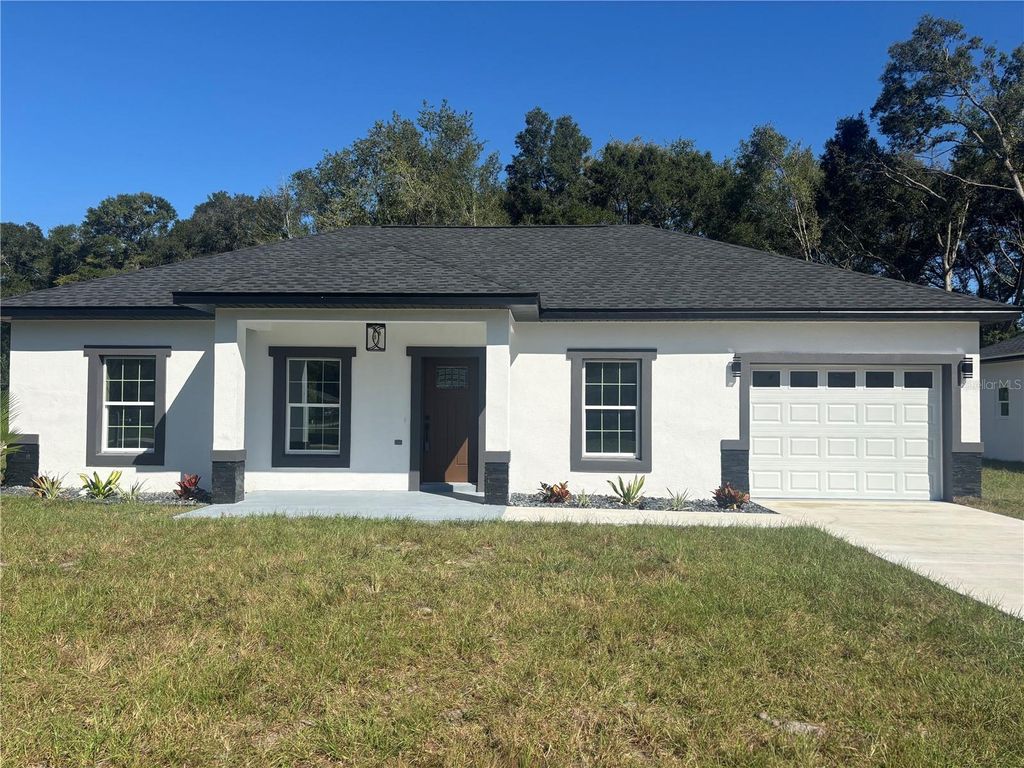 Photo of 2851 SE 142nd Lane, Summerfield, FL 34491 (MLS # OM711583)