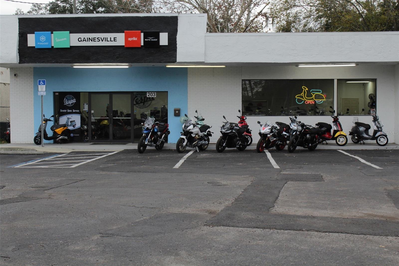 Sublease. Free standing retail building for lease. Currently home to Vespa Motors Adamo Motion Inc. This building features: a roll-up door, a large open concept floorplan and great windows, with easy access and plenty of parking in a large parking lot just off SW 16th AVE. Lease term ends May 31, 2027.
