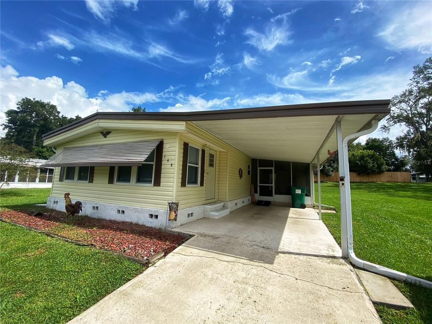 This well-kept 2-bedroom, 2-bathroom mobile home offers 1,372 square feet of comfortable living space on a 0.31-acre corner lot. The home features a spacious living room, a dining area with built-in cabinet storage, and a kitchen equipped with newer appliances.
Enjoy year-round relaxation in the large Florida room, perfect for morning coffee or entertaining guests. The space offers flexibility with windows that can be opened to enjoy the breeze during the cooler months or closed to stay comfortable during the summer.
Step outside to a screened-in, in-ground pool with a generous pool deck—ideal for enjoying Florida’s warm weather. The backyard provides ample space for outdoor activities or gardening.
Additional highlights include a covered carport, a spacious driveway, a screened-in lanai, and a workshop area with washer and dryer hookups. Located in a quiet, well-established neighborhood, this property offers comfort, convenience, and the perfect setting for Florida living.