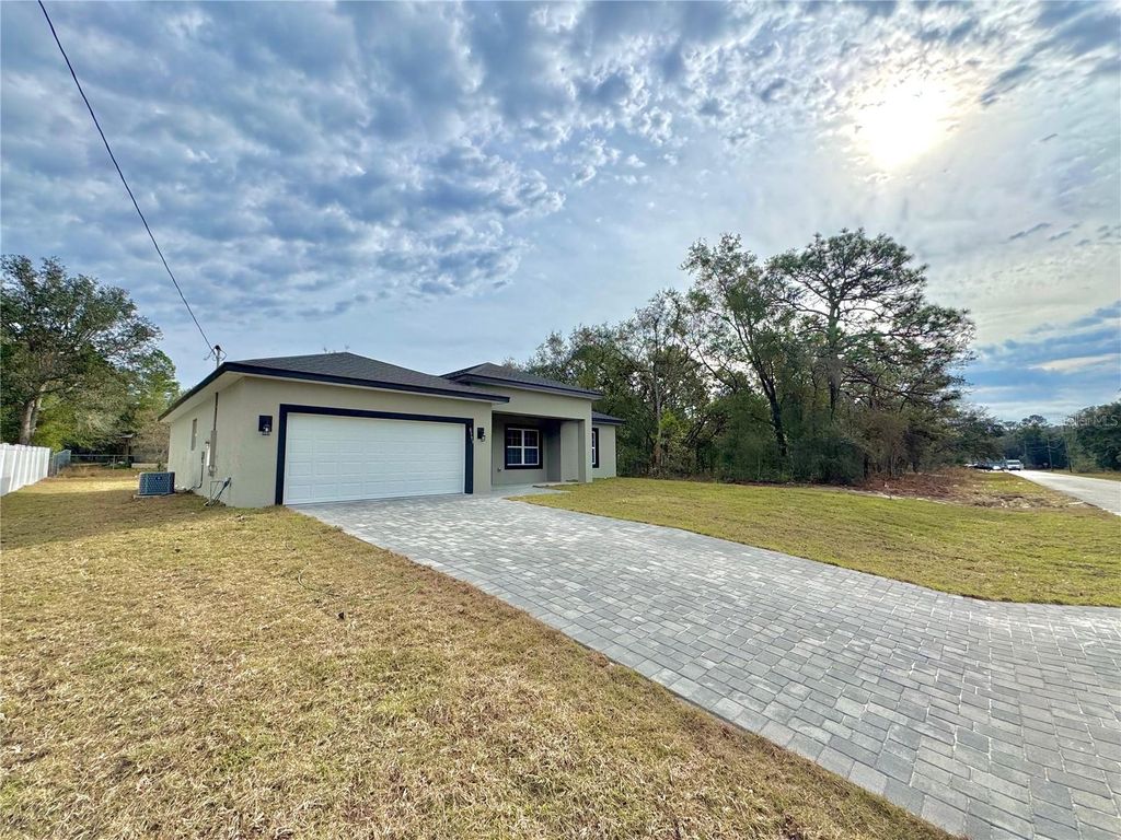 Photo of 8593 N Muller Way, Citrus Springs, FL 34434 (MLS # O6375016)