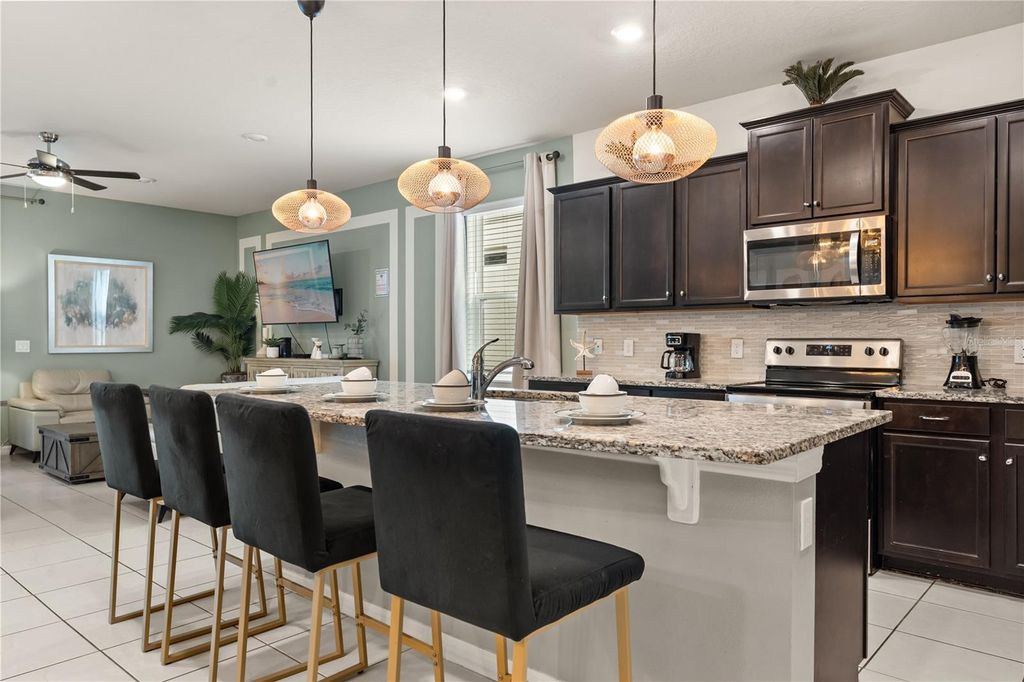 Photo of 2036 Lelani Cir, Davenport, FL 33897 (MLS # O6334617)