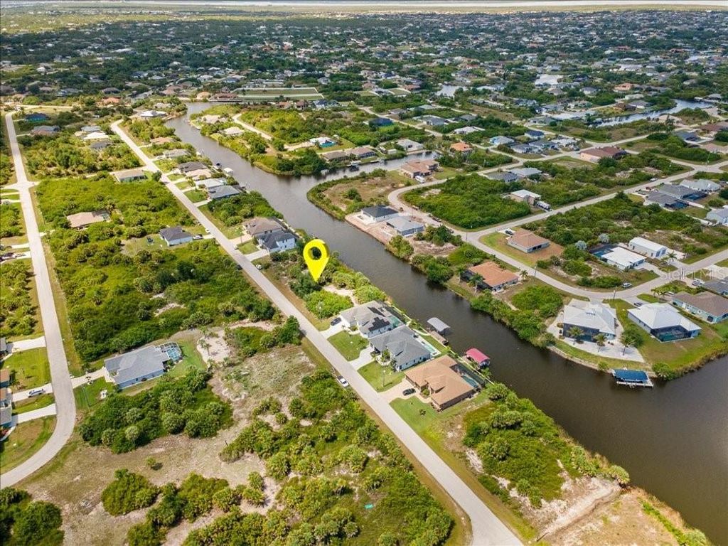 Photo of 10120 Winnipeg Street, Port Charlotte, FL 33981 (MLS # O6410534)
