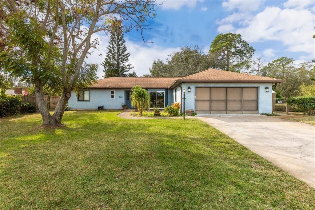 Photo of 2650 Glenwood Avenue, New Smyrna Beach, FL 32168 (MLS # V4946543)