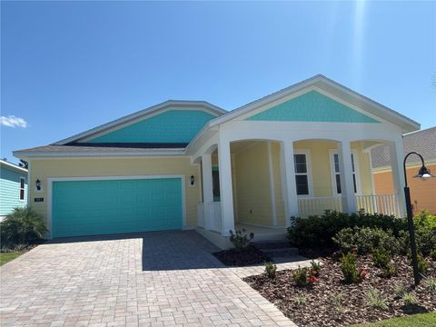 Photo of 991 Fiesta Key Circle, Lady Lake, FL 32159 (MLS # G5099534)