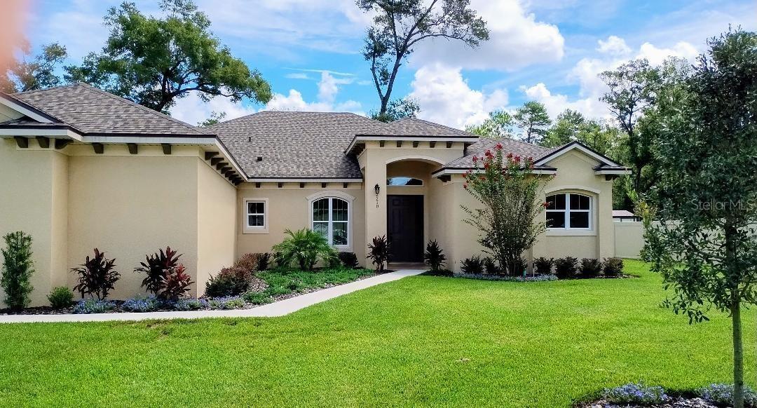GREAT LOCATION, OVERSIZED LOT, NO HOA & NO SEWER BILLS!! Look no further. We have a NEW home located in a VERY NICE neighborhood in Orange City. 3 Bedroom, 3 & 1/2 Bath Custom Home with Oversized 3 car garage. Large master suite with split floor plan. The open floorplan boasts a large gourmet kitchen with family bar, Custom Shaker Cabinetry with crown molding, Large Breakfast Nook, Upgraded Appliances and Under-Cabinet lighting. The large windows allows an abundance of natural light and views not often found. Some features are Vinyl Planked Flooring, Solid Stone countertops, under-mounted sinks, upgraded plumbing fixtures, upgraded appliances, upgraded lighting, PREMIUM bath tile, thick glass shower enclosures and crown moldings in the coffered ceilings. High Performance Low E Glass Windows, High Efficiency Air Conditioning, R38 Ceiling Insulation and a home built to the latest construction and energy codes that will give you years of energy efficient comfort. The Master Suite has direct access to the Patio and two large walk in closets, a large double lavatory, compartmental water closet, thick glass walk in shower and free standard tub enhanced by the custom tiled wall surrounds. This home is pool planned with an outside door from Bath 2 and the Master Bedroom. Sodded Oversized Lot, Lush Landscaping and Automatic Irrigation System. Central location just minutes to I-4, Library, Major Shopping, and Medical Centers. Less than an hour to the Daytona Area Beaches, 3 International Airports, Orlando and Theme Parks. Only 10 minutes to the St. Johns River to enjoy watersports, boating and fishing. Highbanks Marina on the St. Johns River offers a river view Restaurant, camping and boat launch. Just 10 minutes away is Blue Springs State Park, famous for Camping and Manatee watching. 1 Year Builder Warrantee on Structure.