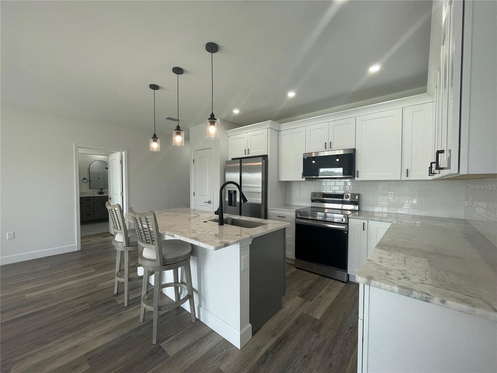 Photo of 26 Donlon Drive, Rotonda West, FL 33947 (MLS # C7532576)
