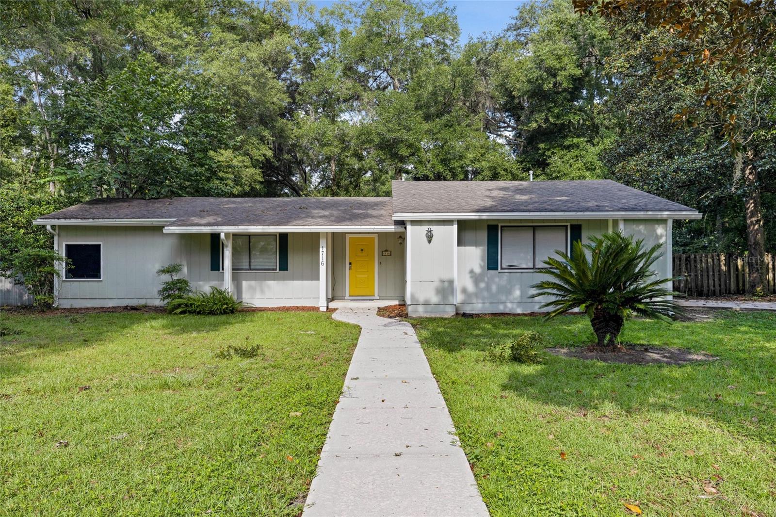 This 4 bedroom/ 2 bath home features large living space and bedrooms with an updated kitchen with SS Appliances. Inside Laundry with Washer and Dryer. No carpet and a large Florida room. Large back yard with privacy fence.