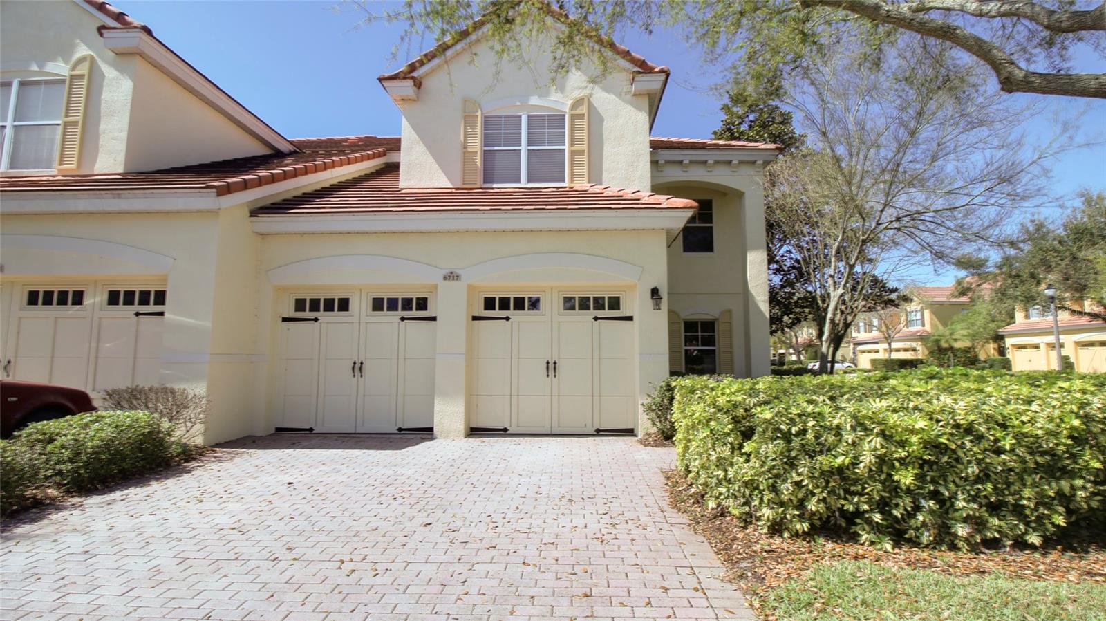 Gorgeous corner end townhouse in the heart of Dr. Phillips. This 3 bed/ 2.5 bath is located in a gated community that features resort-like Community Pool and Spa, Fitness Center, and Clubhouse. Cook like a true chef in this dream kitchen that has custom Cabinets with backslash, stainless steel appliances, and beautiful countertops. From the Kitchen you can make your way out to the screened Lanai overlooking a brick paver patio. On the second floor you will find a balcony style layout with 3 Bedrooms and 2 Bathrooms. French Doors lead you to the Master bedroom with a Walk-in Closet and large Bathroom including dual sinks and separate Shower and Tub. This townhouse is centrally located with easy access to Universal Studios, Walt Disney World, Sea World, Airport, and Downtown. Dr. Phillips has Restaurant Row with Boutiques, Shopping, and Restaurants. Don't miss out on the chance to make this your new home!
