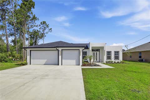Photo of 14 Ferngate Lane, Palm Coast, FL 32137 (MLS # FC318500)