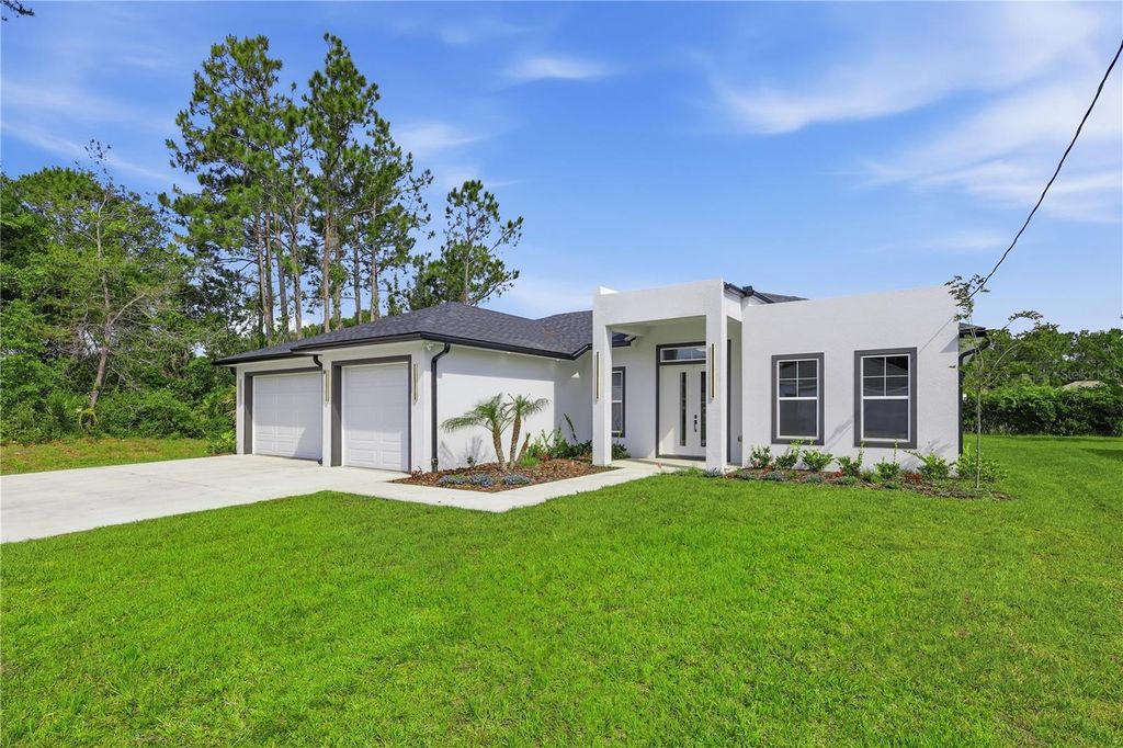 Photo of 14 Ferngate Lane, Palm Coast, FL 32137 (MLS # FC318500)