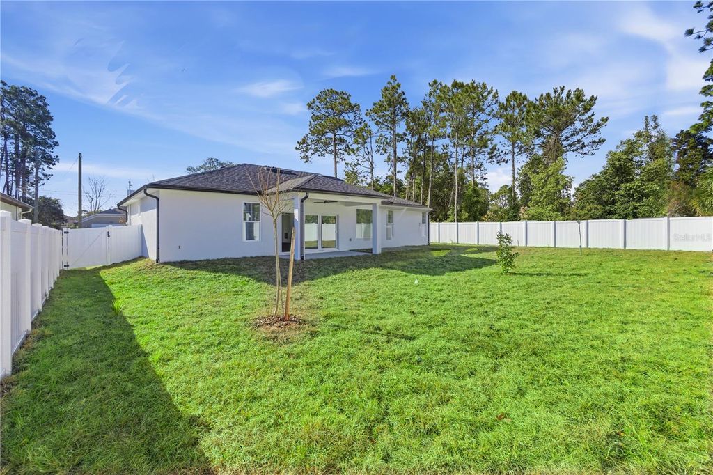 Photo of 14 Ferngate Lane, Palm Coast, FL 32137 (MLS # FC318500)