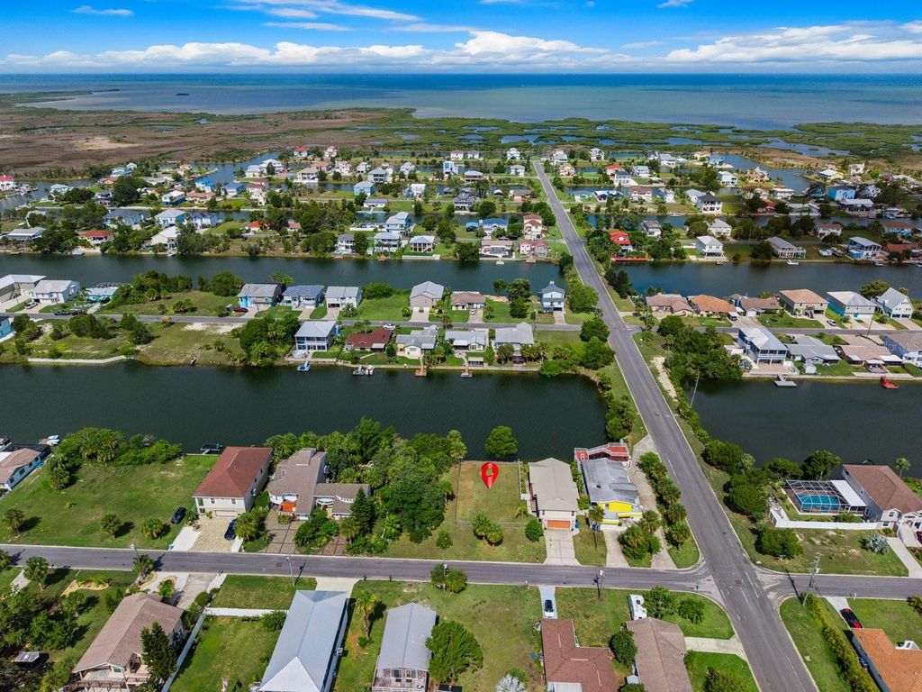 Photo of 3287 Sea Grape Drive, Hernando Beach, FL 34607 (MLS # W7887639)