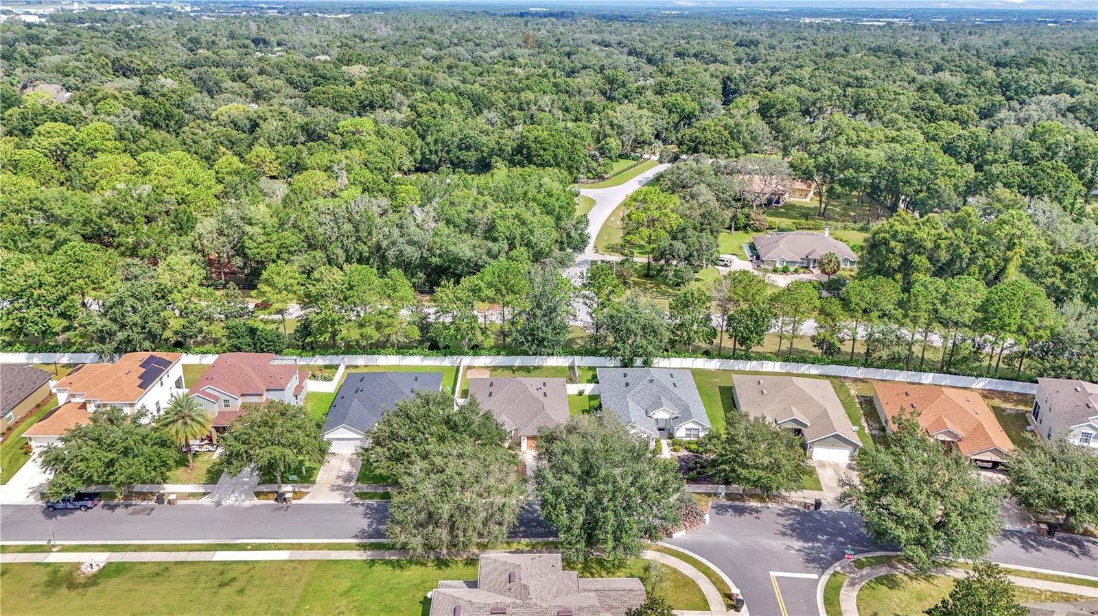Discover the perfect blend of comfort and community at 5155 SW 39th St in Ocala. This inviting 2-bed, 2-bath home offers nearly 1,700 sq ft of living space, thoughtfully expanded with a sunroom that’s fully enclosed and part of the cooled interior — perfect as a reading nook, hobby space, or bonus living area. A brand-new roof (2024) provides peace of mind, while the fully fenced backyard with no rear neighbors creates a private retreat ideal for relaxing or entertaining. Inside, the kitchen shines with stainless steel appliances (2018), and the open living and dining layout makes everyday living and hosting guests a breeze. Step outside your front door and enjoy all the community amenities — including basketball and tennis courts, a soccer field, sand volleyball, a sparkling pool, and a playground. With a low monthly HOA and a convenient location close to shopping, dining, and major routes, this home checks all the boxes for comfortable Florida living.