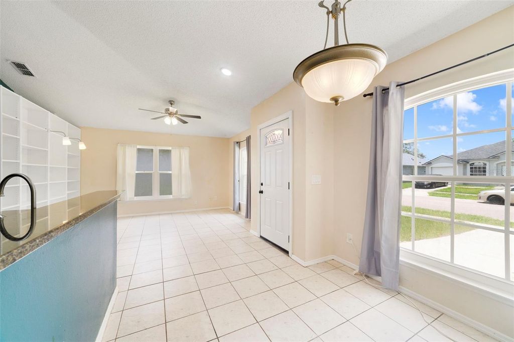 Photo of 7692 Pine Fork Drive, Orlando, FL 32822 (MLS # O6422226)
