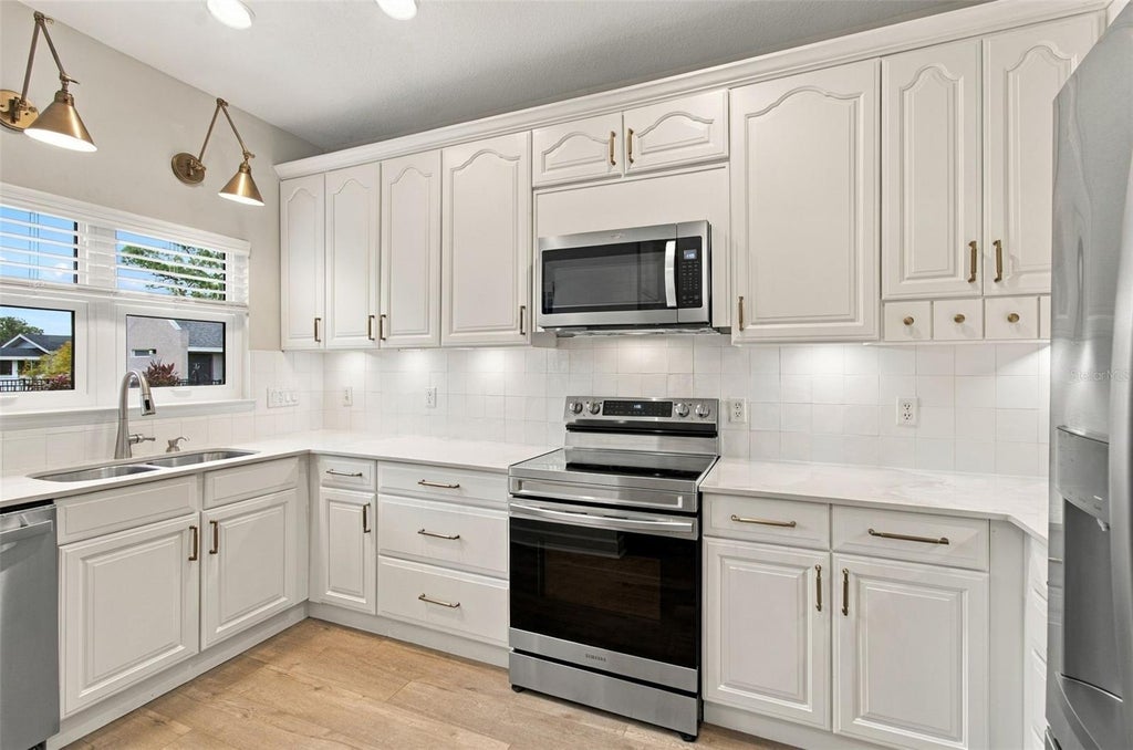 Photo of 5303 Point Pleasant Lane, Tampa, FL 33611 (MLS # TB8556707)