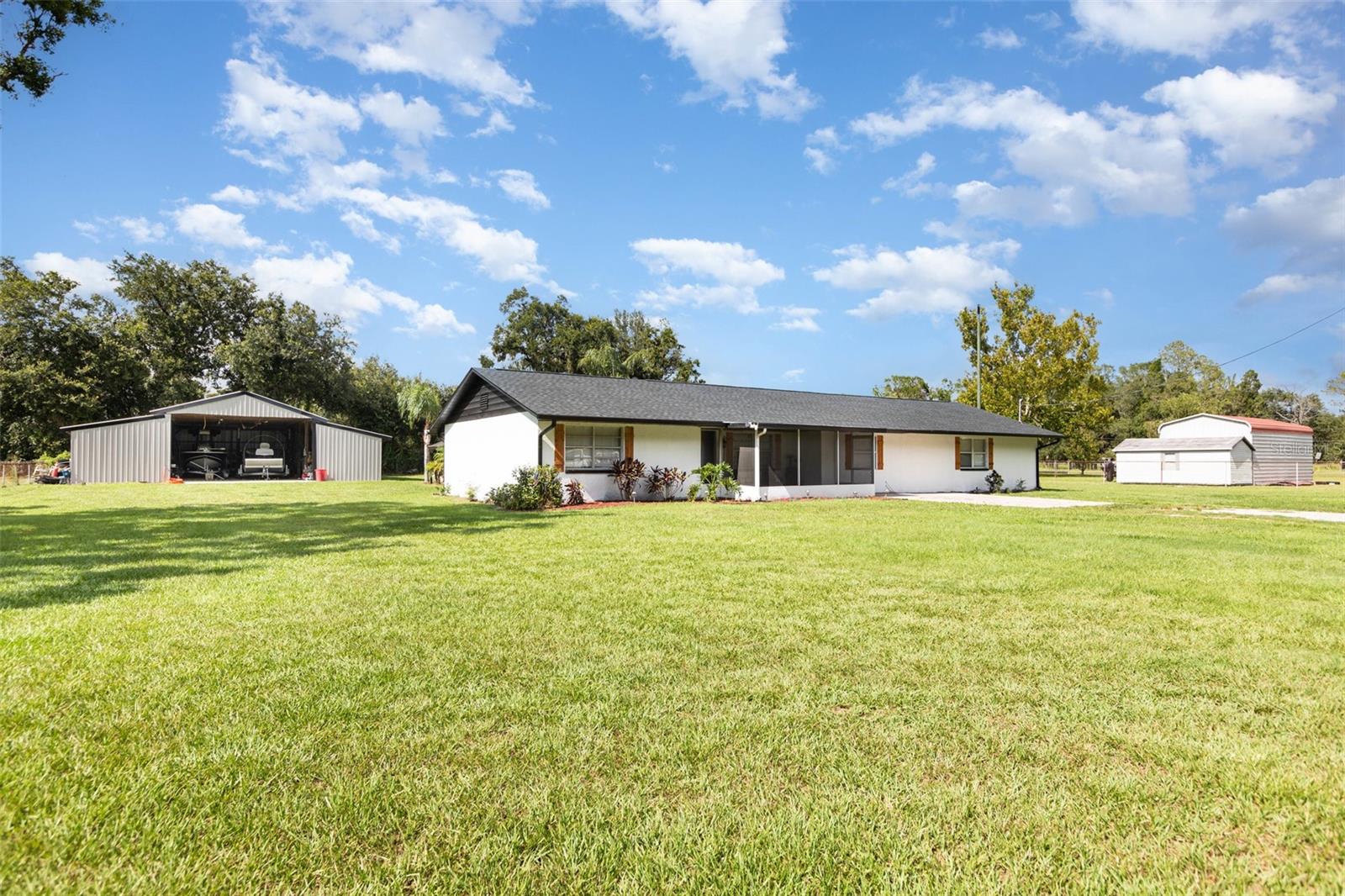 Beautifully Upgraded 3,200 Sq. Ft. Home on a Full Acre!
This meticulously updated home offers space, style, and function both inside and out. Situated on a full acre, it features a 48x48 barn equipped with 220 power, 110v outlets at each pole, a 15,000 lb hydraulic lift, and brand-new metal siding—perfect for serious projects or extra storage.
Recent upgrades include a new roof (2025), newer AC, fresh interior and exterior paint, new gutters, modern fixtures, and 2025 kitchen appliances, all contributing to a move-in-ready experience.
Outdoor living is just as impressive, with a spacious 18x30 covered porch, a charming 12x12 gazebo, and plenty of room to entertain or relax under the open sky.
Don’t miss this opportunity to own a turnkey property with room to spread out—schedule your showing today!