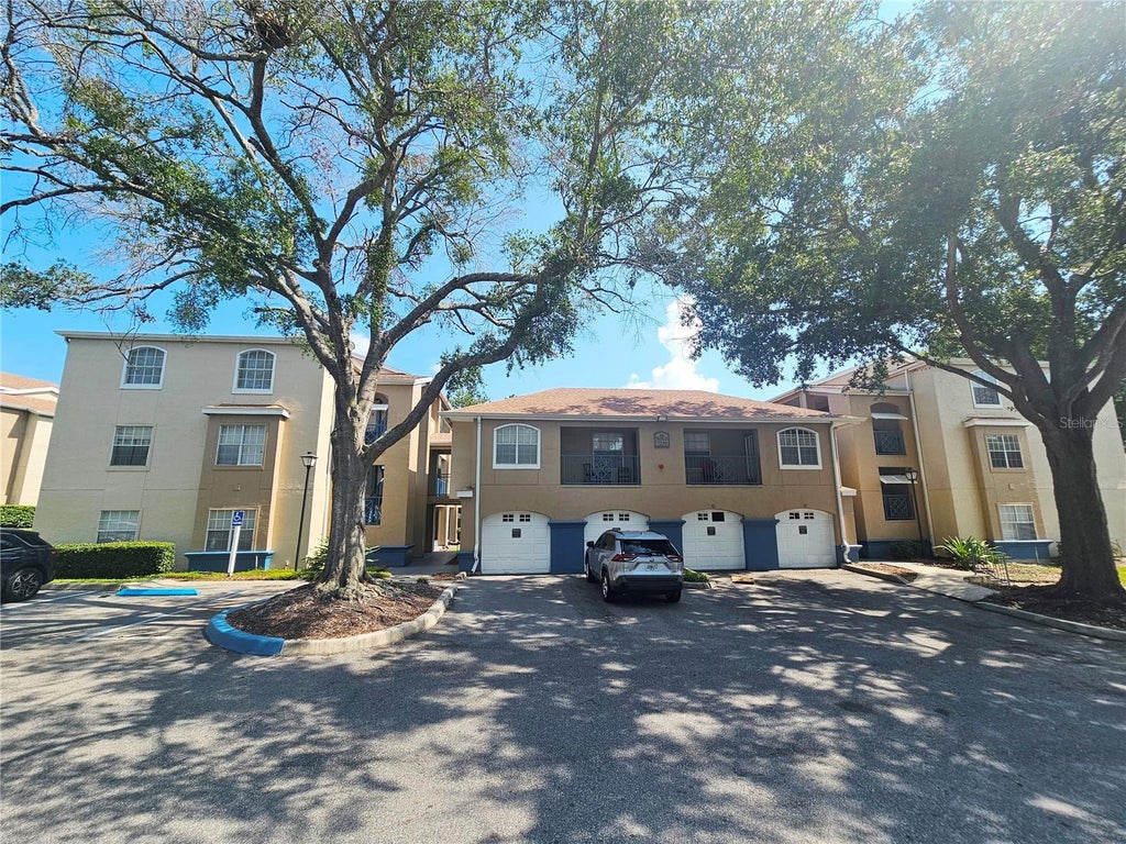 Photo of 7230 Westpointe Boulevard #1232, Orlando, FL 32835 (MLS # O6433565)
