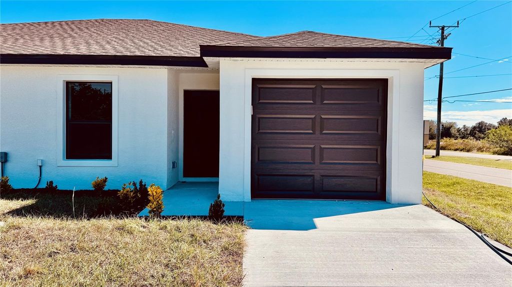 Photo of 15506 Chamberlain Boulevard, Port Charlotte, FL 33953 (MLS # O6402252)