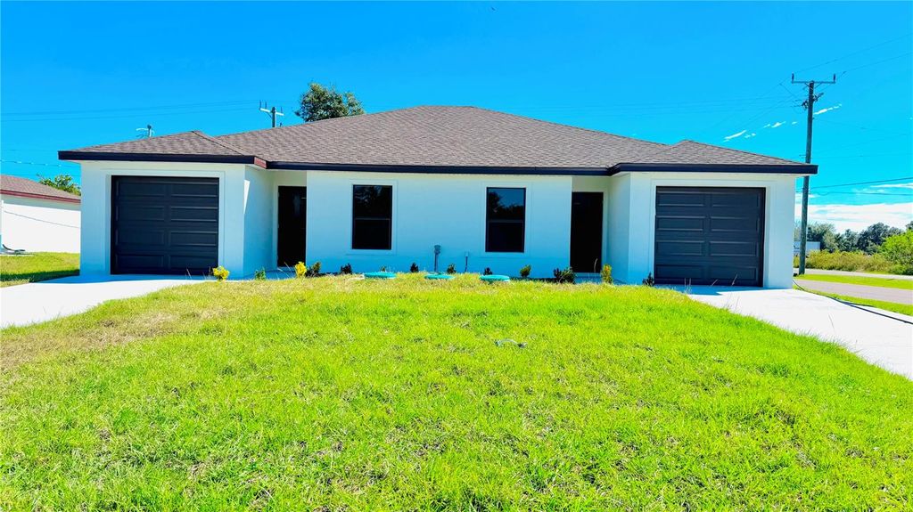 Photo of 15506 Chamberlain Boulevard, Port Charlotte, FL 33953 (MLS # O6402252)