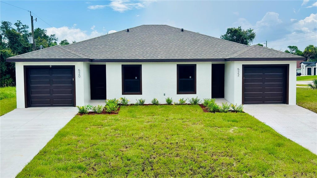 Photo of 15506 Chamberlain Boulevard, Port Charlotte, FL 33953 (MLS # O6402252)
