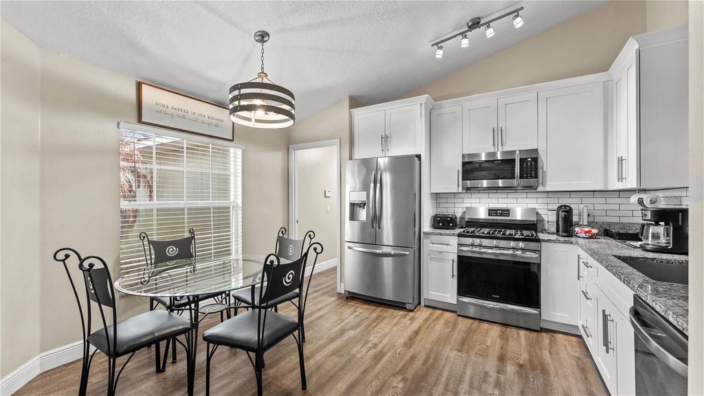 Photo of 706 Dolcetto Drive, Davenport, FL 33897 (MLS # O6392064)