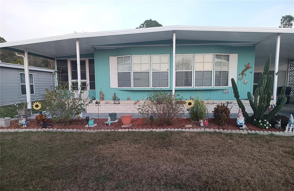 Photo of 3318 Carnation Lane, Zephyrhills, FL 33541 (MLS # TB8464361)