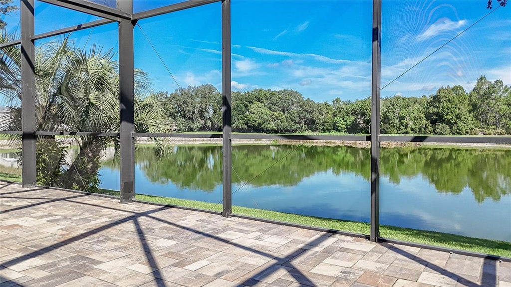 Photo of 4907 Pointe O Woods Drive, Wesley Chapel, FL 33543 (MLS # TB8526776)