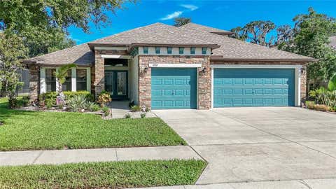 Photo of 4907 Pointe O Woods Drive, Wesley Chapel, FL 33543 (MLS # TB8526776)