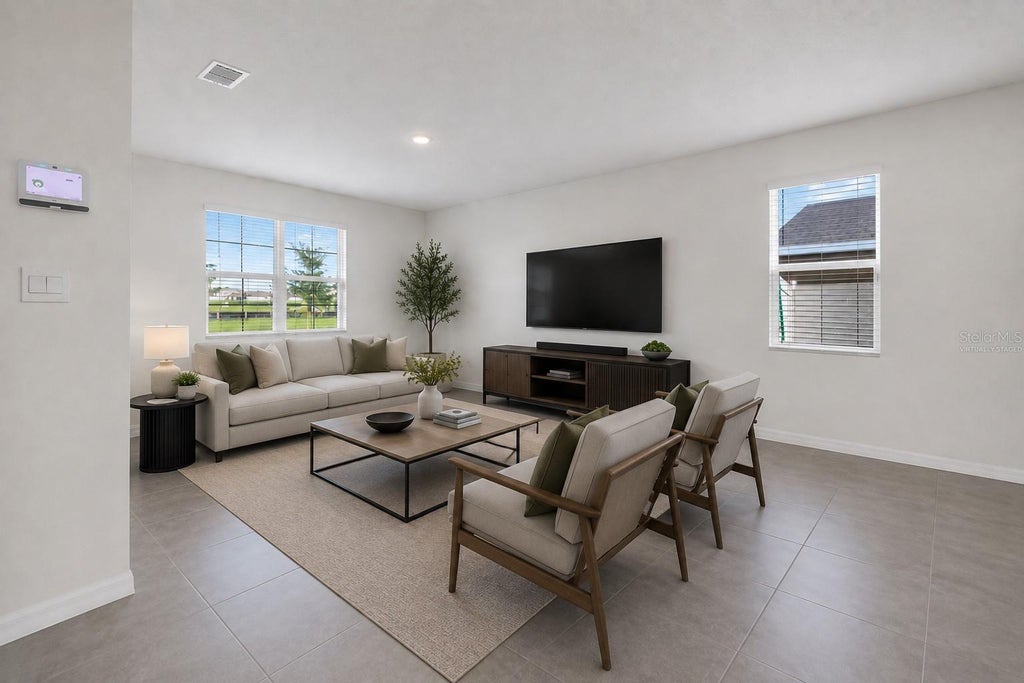 Photo of 1021 Silverbell Trail, Saint Cloud, FL 34771 (MLS # O6434414)