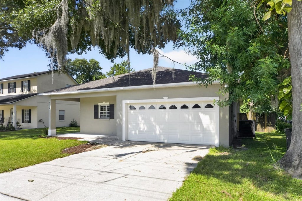 Photo of 300 S Woodland Street, Winter Garden, FL 34787 (MLS # O6431568)