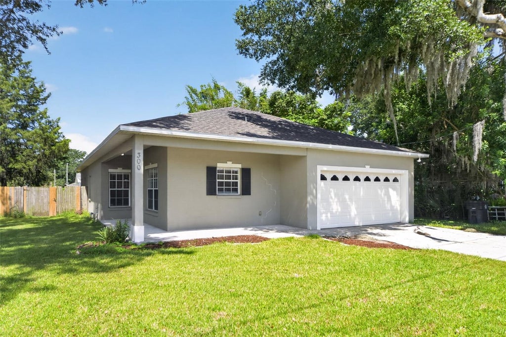 Photo of 300 S Woodland Street, Winter Garden, FL 34787 (MLS # O6431568)