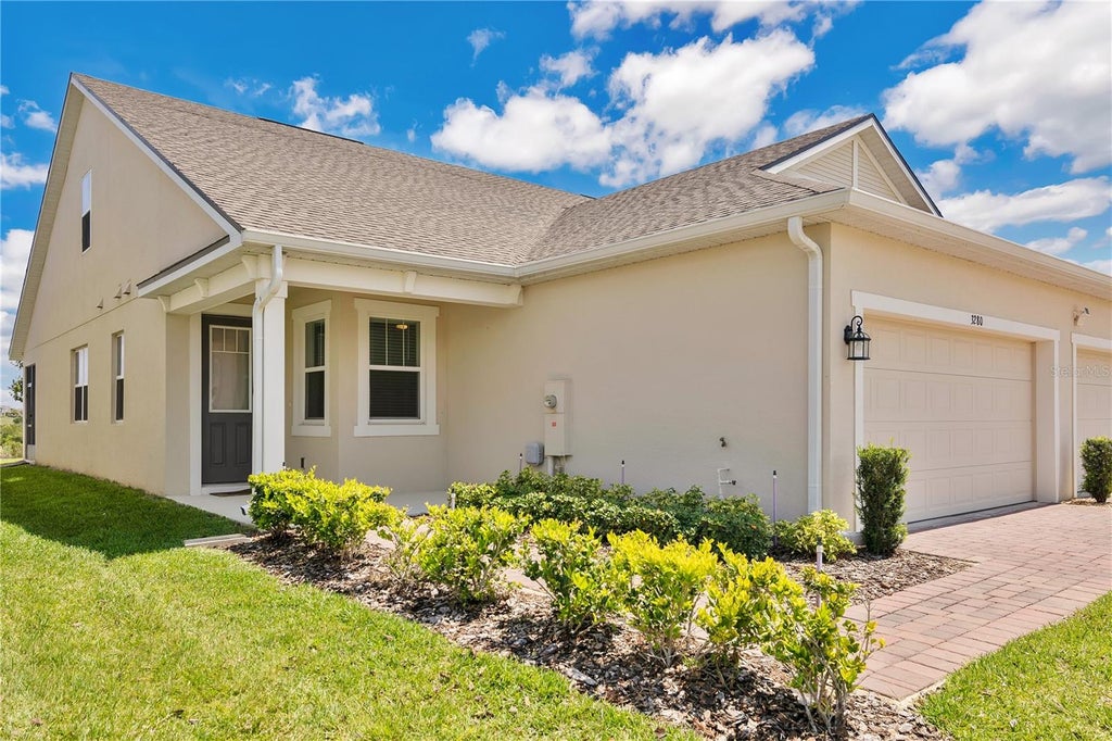 Photo of 3280 Canna Lily Place, Clermont, FL 34711 (MLS # O6448602)