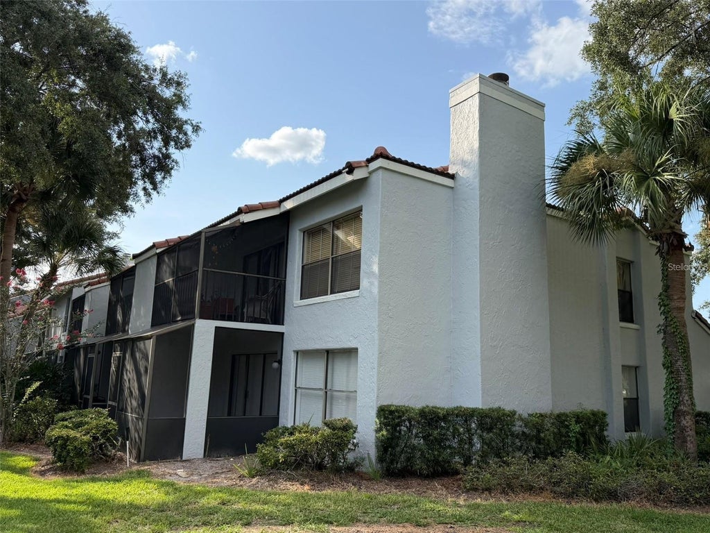 Photo of 4702 Sutton Terrace #108, Orlando, FL 32811 (MLS # O6430361)