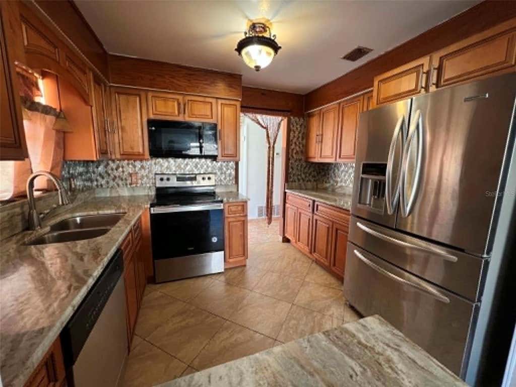 Photo of 4826 Indialantic Drive, Orlando, FL 32808 (MLS # S5154490)