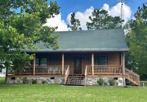 Photo of 9711 NE 69th Place, Bronson, FL 32621 (MLS # OM719251)