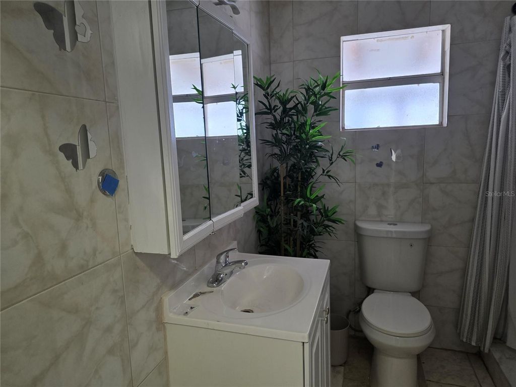 Photo of 3422 W Idlewild Avenue #A-1, Tampa, FL 33614 (MLS # TB8524829)