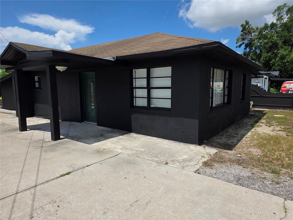 Photo of 3422 W Idlewild Avenue #A-1, Tampa, FL 33614 (MLS # TB8524829)