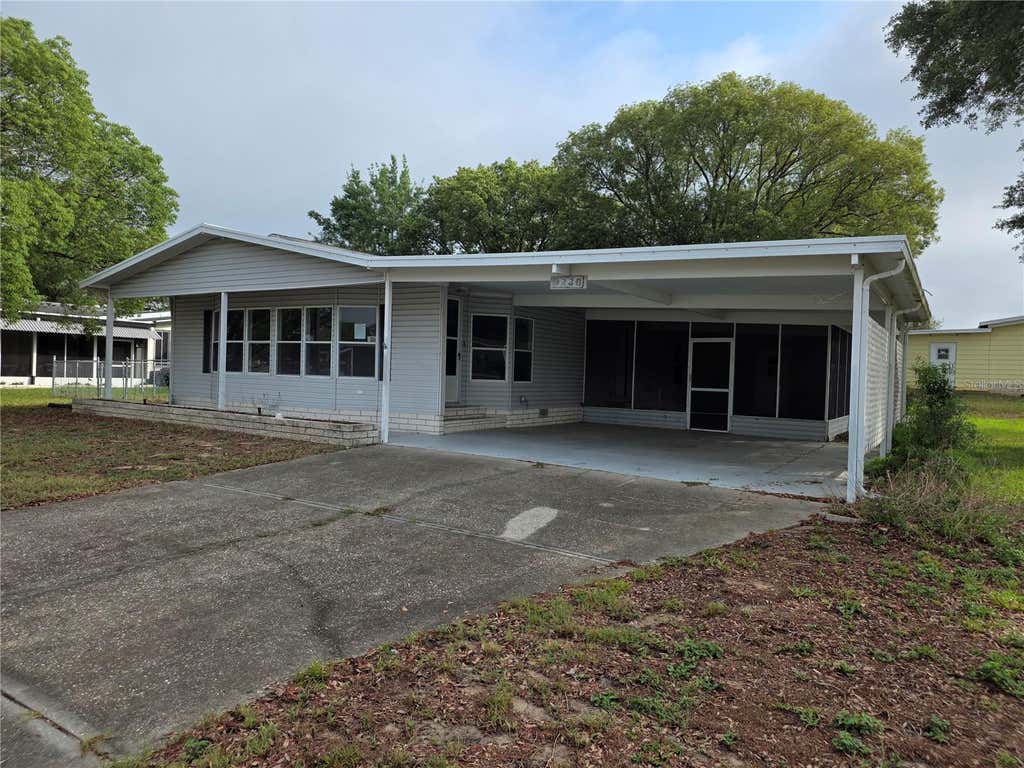 Photo of 9236 Denmarsh Drive, Brooksville, FL 34613 (MLS # TB8513242)