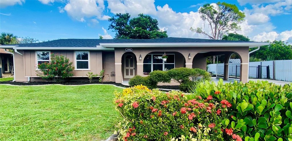 Photo of 1490 Yorkshire Street, Port Charlotte, FL 33952 (MLS # A4663902)